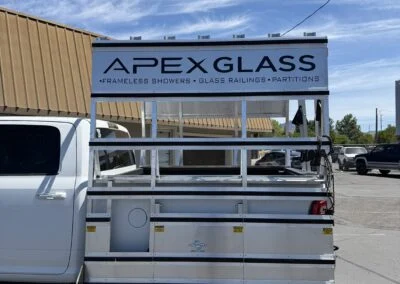 Rear of an Apex Glass work truck with aluminum glass rack